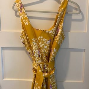 Golden yellow A-line belted dress with pockets.